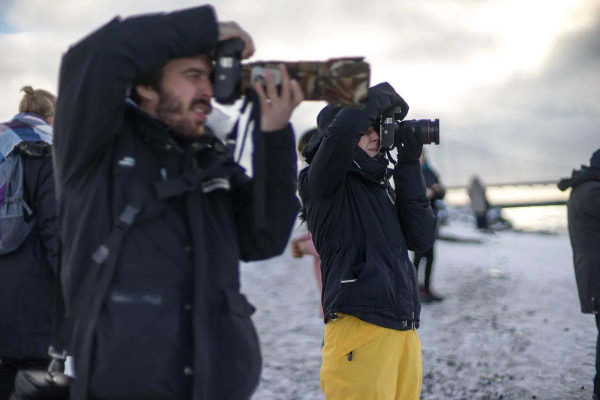 Vincent Piccerelle en train de photographier sur la Grande Odyssée
